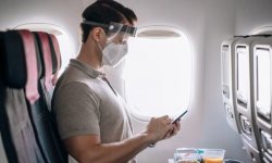 Британские ученые: в самолете лучше сидеть в начале салона
